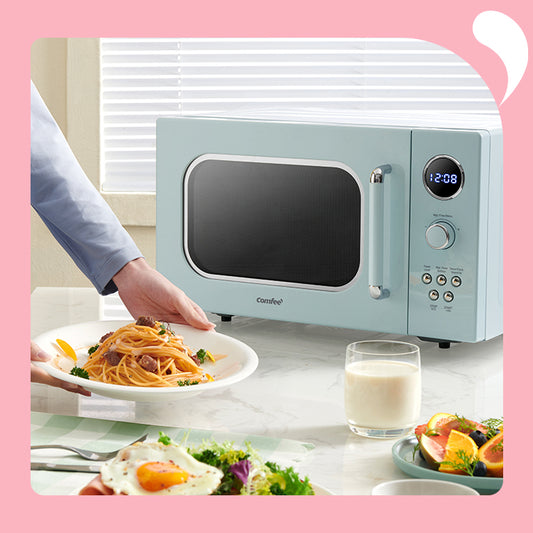 various cooked foods in front of a microwave oven