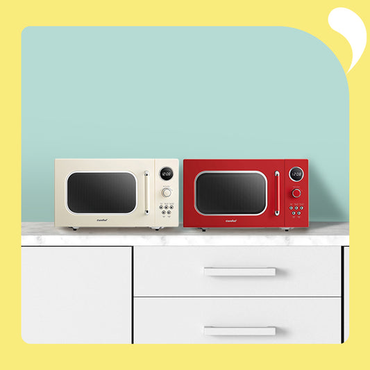 retro apricot microwave and red microwave on the table