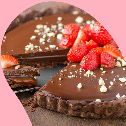 chocolate raspberry tart with strawberries on top