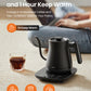 A person works beside Comfee gooseneck kettle and tea