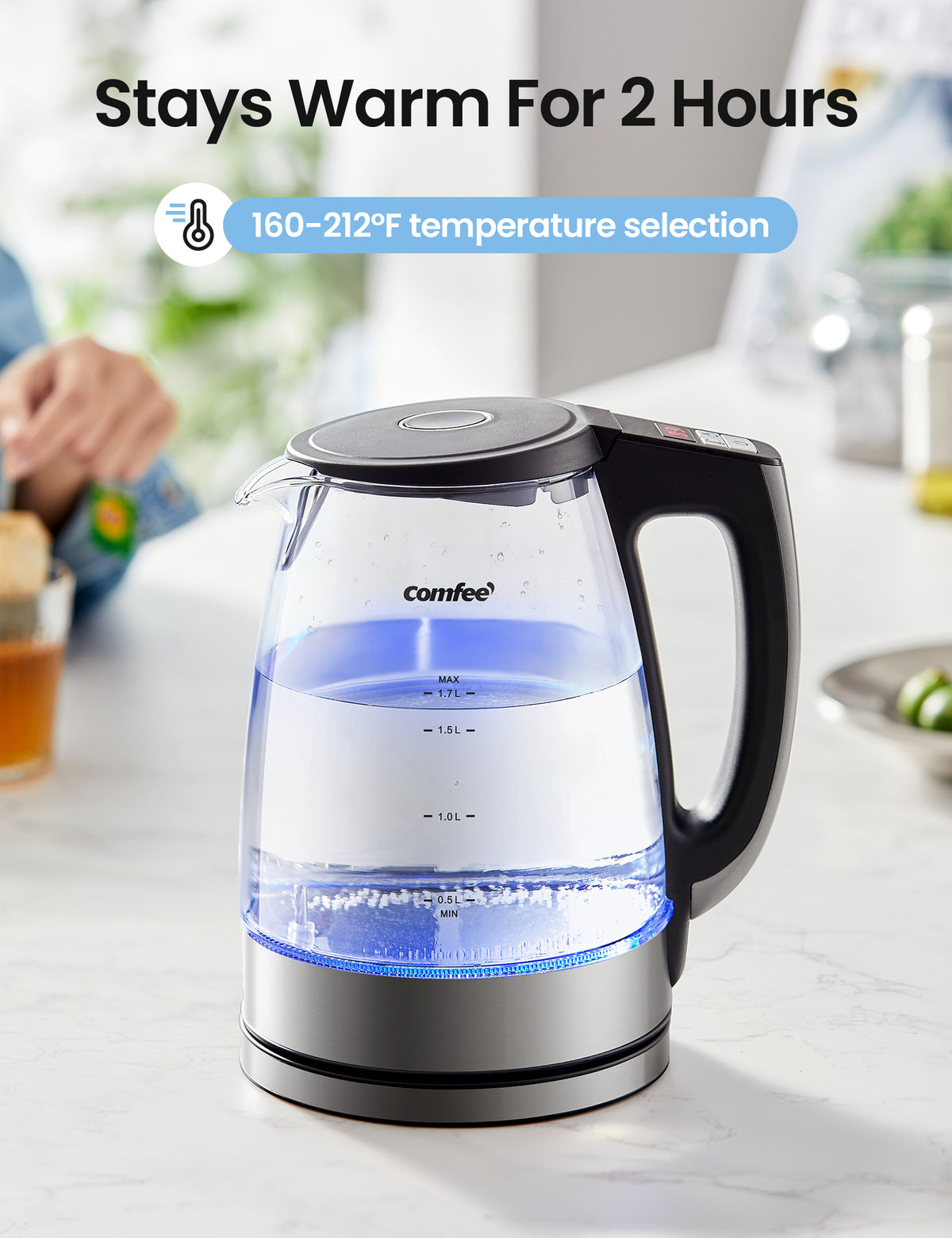 Comfee glass kettle with blue light on table