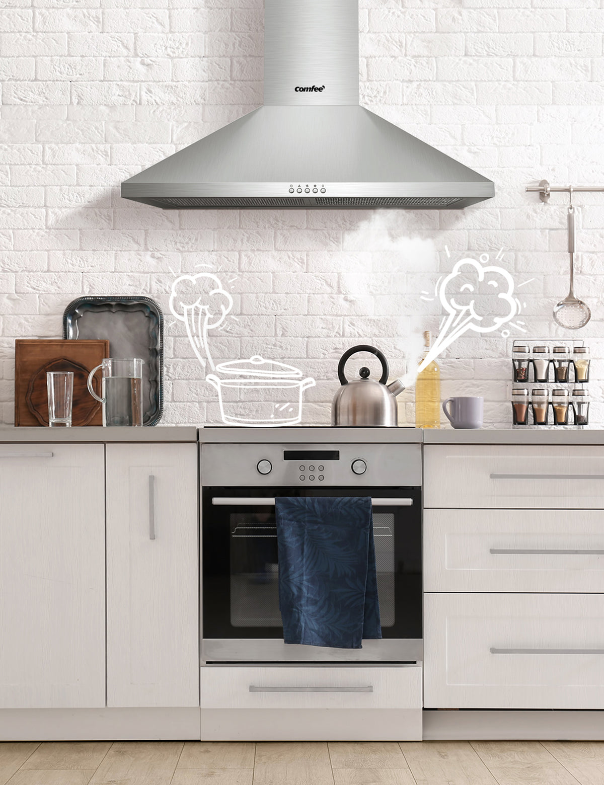 wall mount ducted range hood sucking smoke from a kettle on a oven