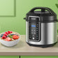 stainless steel pressure cooker on a cabinet next to a bowl of oatmeal and strawberries and a cup of milk